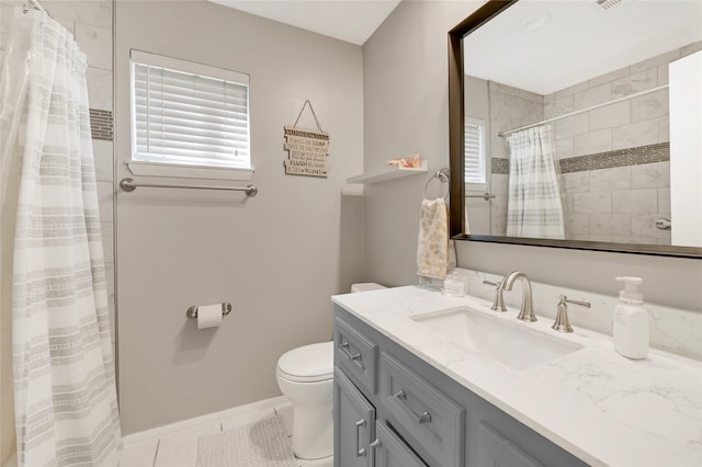 full bathroom featuring curtained shower, toilet, vanity, baseboards, and tile patterned floors