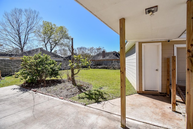 view of yard featuring a fenced backyard and a patio area