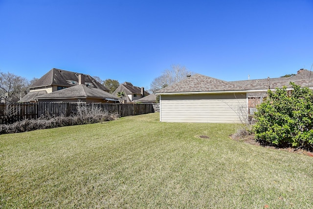 view of yard with fence