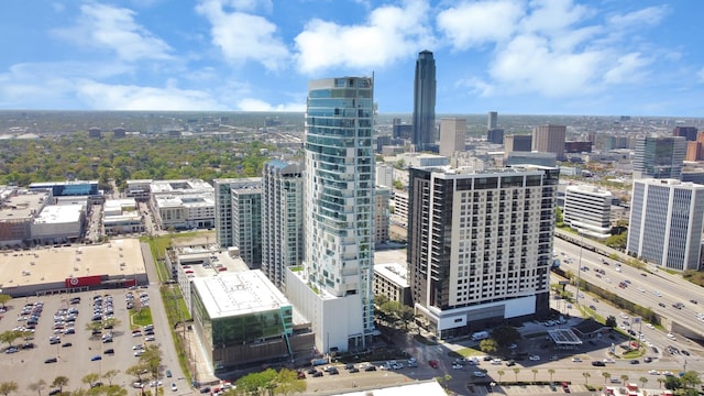 birds eye view of property with a city view