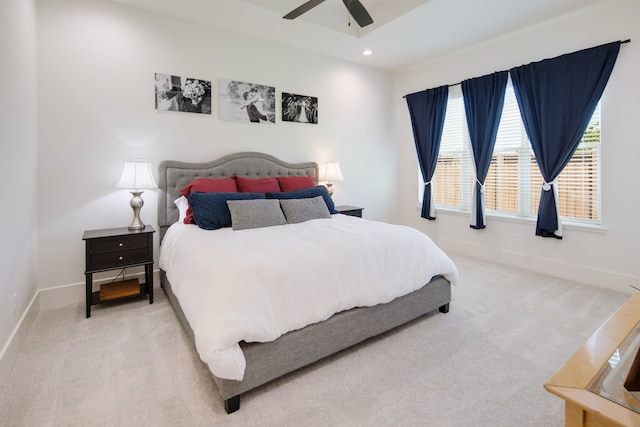 bedroom featuring recessed lighting, light colored carpet, ceiling fan, and baseboards