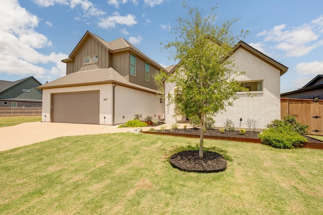 view of front of house with board and batten siding, brick siding, fence, and driveway