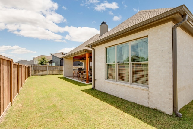 view of yard featuring a fenced backyard and a patio