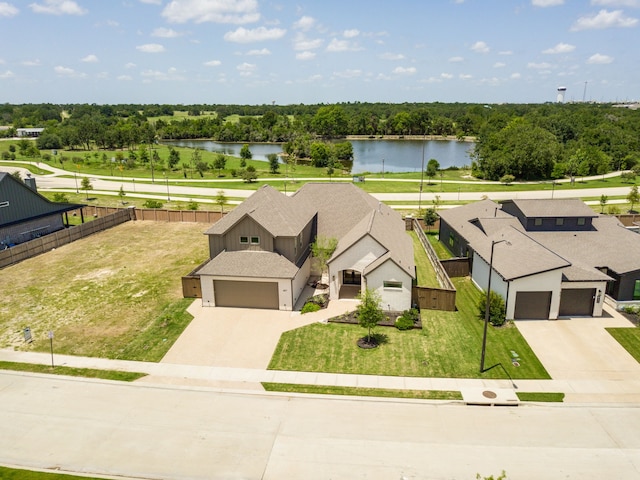 drone / aerial view featuring a water view