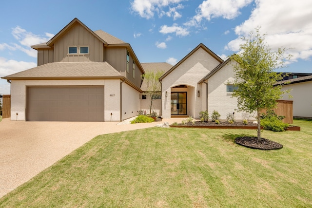 view of front of house featuring brick siding, concrete driveway, board and batten siding, a front yard, and a garage