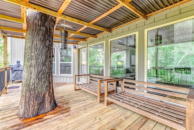 sunroom / solarium with a healthy amount of sunlight