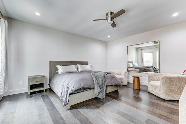 bedroom with ceiling fan, wood finished floors, and recessed lighting