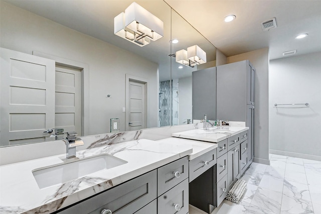 full bathroom featuring double vanity, visible vents, a sink, and recessed lighting