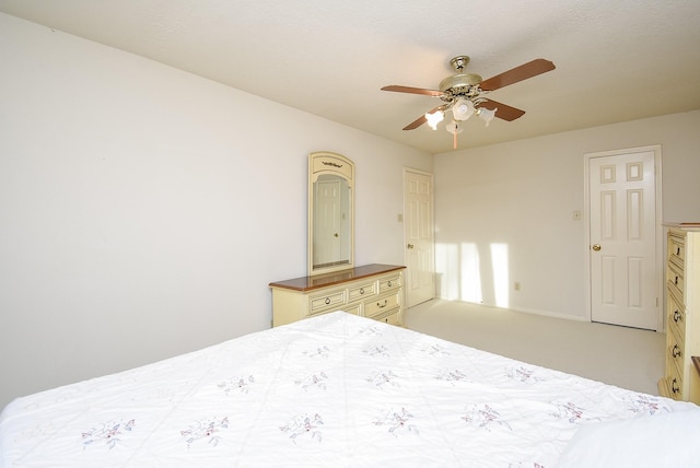 unfurnished bedroom featuring a ceiling fan