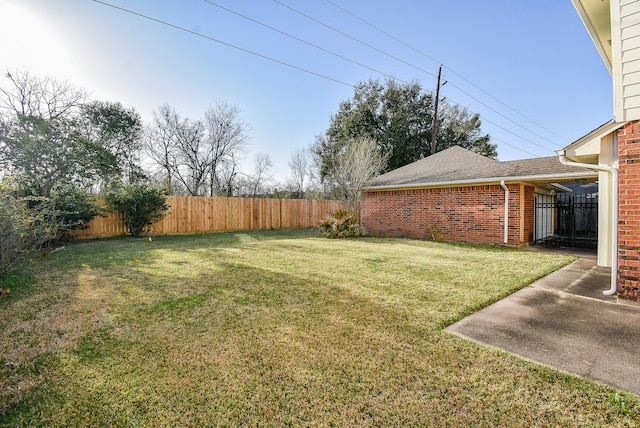 view of yard featuring fence