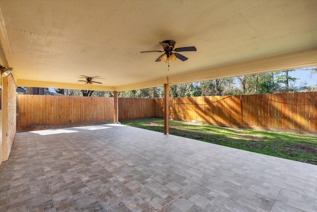 view of patio with ceiling fan and a fenced backyard