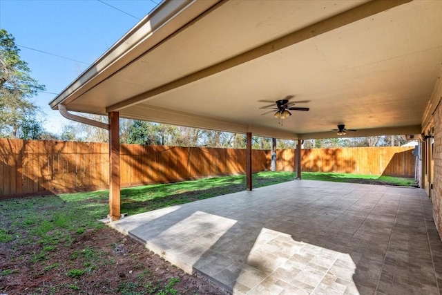 view of patio / terrace featuring a fenced backyard and a ceiling fan