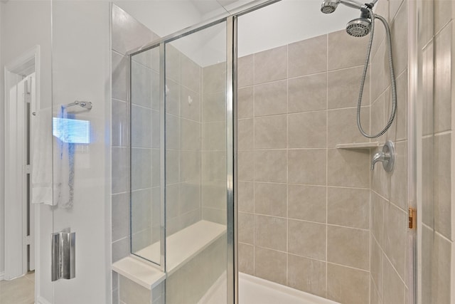 bathroom featuring a shower stall