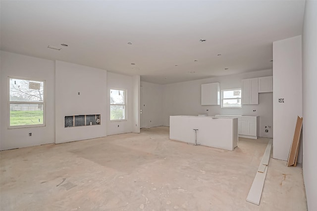 unfurnished living room with a fireplace