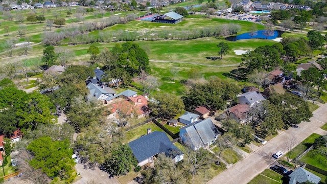 bird's eye view featuring a water view and a residential view