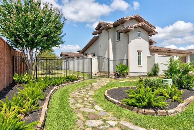 view of yard with a fenced backyard