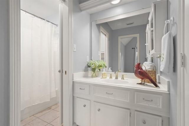 full bath featuring tile patterned flooring, visible vents, shower / tub combo with curtain, and vanity