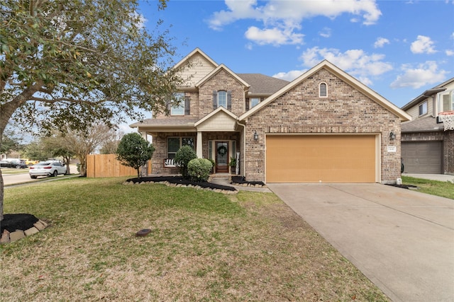 view of front of property with driveway, an attached garage, fence, a front lawn, and brick siding