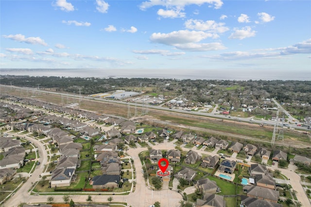 aerial view featuring a water view and a residential view