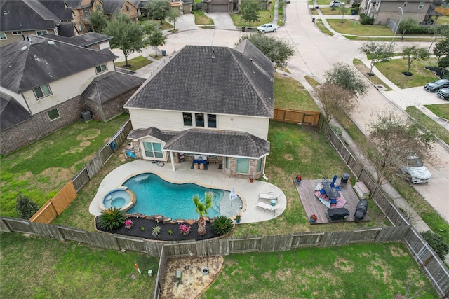 drone / aerial view with a residential view