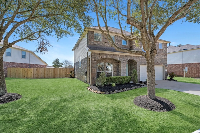 traditional-style home with brick siding, an attached garage, fence, driveway, and a front lawn