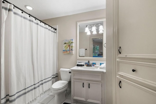 full bathroom with a shower with shower curtain, vanity, and toilet