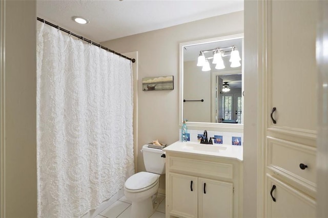 bathroom with tasteful backsplash, a shower with shower curtain, toilet, vanity, and tile patterned flooring