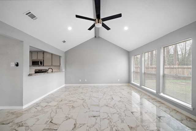 unfurnished living room with recessed lighting, visible vents, baseboards, marble finish floor, and beam ceiling