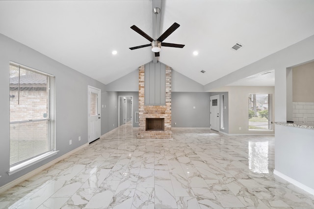 unfurnished living room with ceiling fan, a fireplace, visible vents, baseboards, and marble finish floor