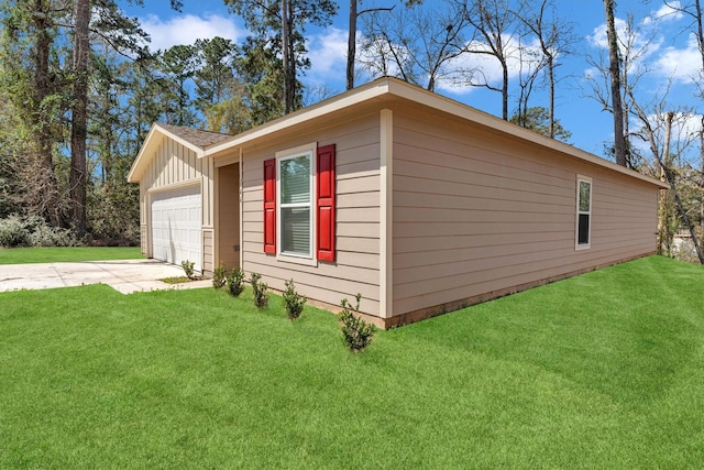 view of property exterior featuring a garage, a yard, board and batten siding, and driveway