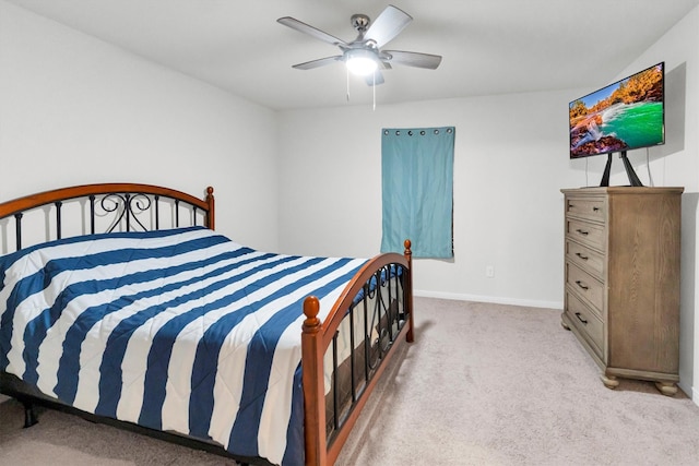 bedroom featuring carpet floors, a ceiling fan, and baseboards