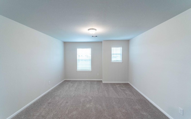 8125 Coral Dr, Texas City, TX 77591 - empty room featuring carpet floors and baseboards