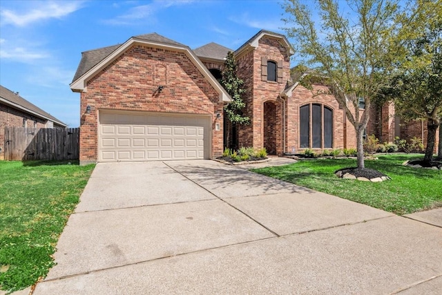 traditional home featuring brick siding, concrete driveway, and a front lawn