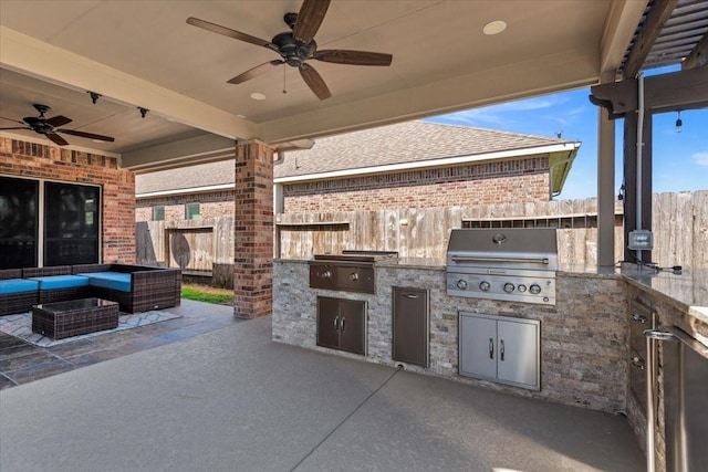 view of patio / terrace with grilling area, an outdoor hangout area, area for grilling, and fence