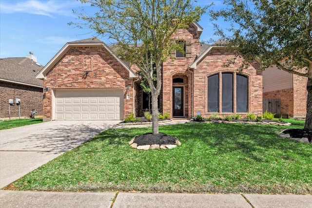 traditional-style house featuring an attached garage, brick siding, concrete driveway, and a front yard