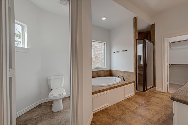 full bathroom featuring visible vents, a shower stall, toilet, and a bath