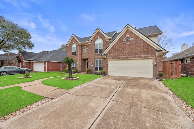 traditional-style house featuring brick siding, roof with shingles, an attached garage, driveway, and a front lawn