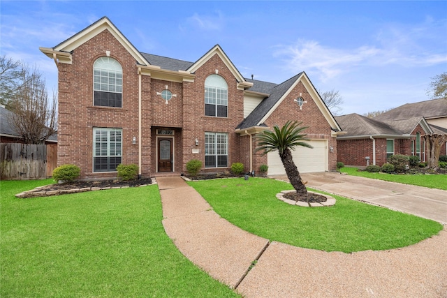 traditional home featuring a front yard, fence, and brick siding