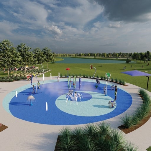 view of community featuring a water view and a lawn