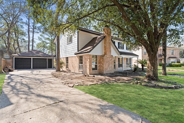 view of side of home featuring a garage, brick siding, an outdoor structure, a lawn, and a chimney