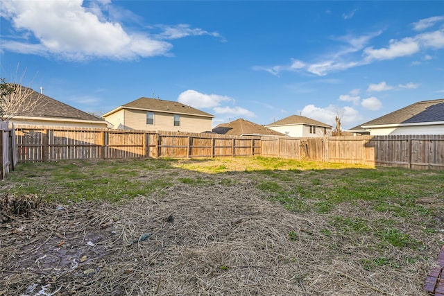 view of yard featuring a fenced backyard