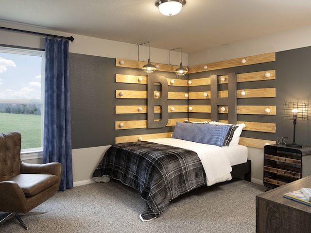 carpeted bedroom featuring baseboards