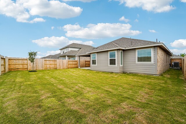 2542 Bay Winds Ln, Baytown, TX 77523 - back of property with cooling unit and roof with shingles