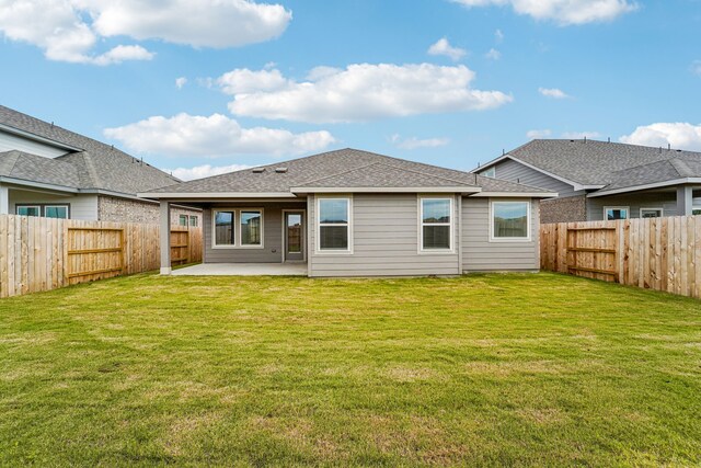 2542 Bay Winds Ln, Baytown, TX 77523 - rear view of property featuring a patio and a shingled roof