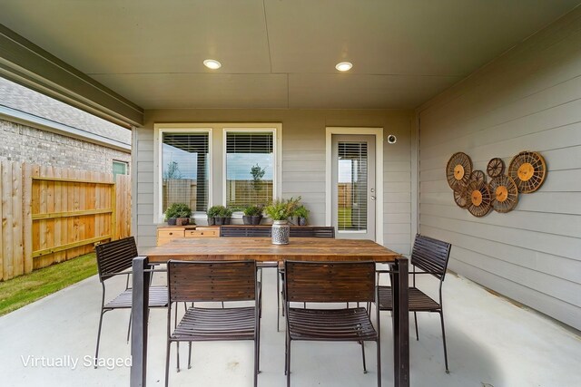 2542 Bay Winds Ln, Baytown, TX 77523 - view of patio / terrace featuring outdoor dining area