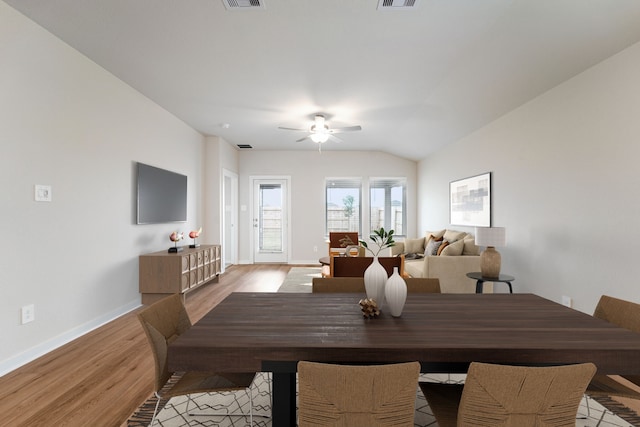 2542 Bay Winds Ln, Baytown, TX 77523 - dining space with light wood finished floors, a ceiling fan, baseboards, and lofted ceiling