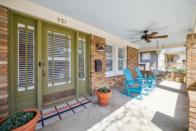 view of patio / terrace featuring a porch and a ceiling fan