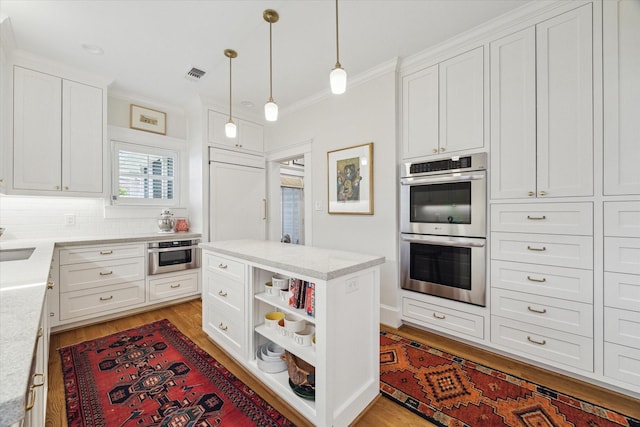 kitchen with open shelves, visible vents, double oven, light wood-style floors, and white cabinetry