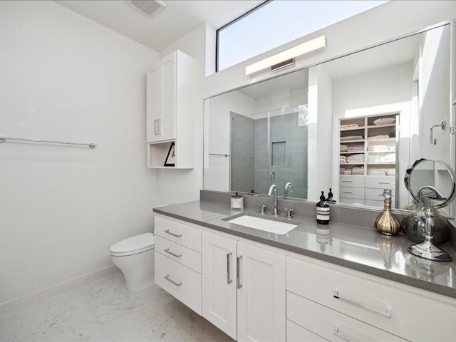 full bathroom featuring a stall shower, visible vents, toilet, marble finish floor, and vanity