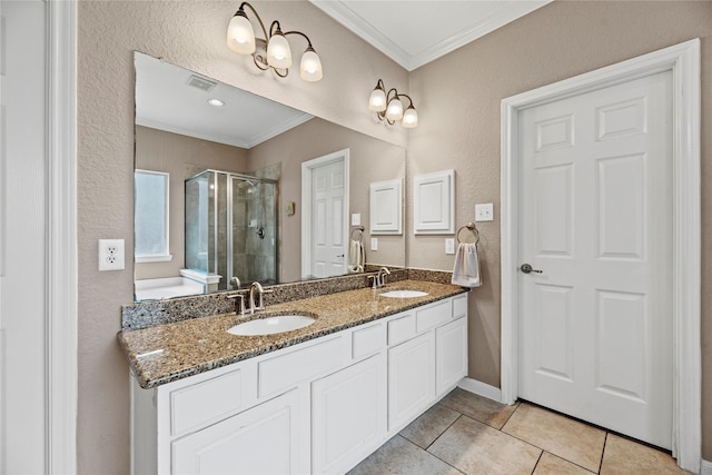 bathroom with crown molding, visible vents, a sink, and a shower stall